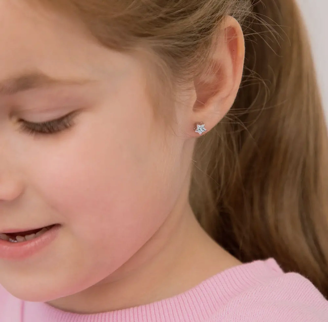 Zilveren kinderoorbellen: Ster met schroefsluiting