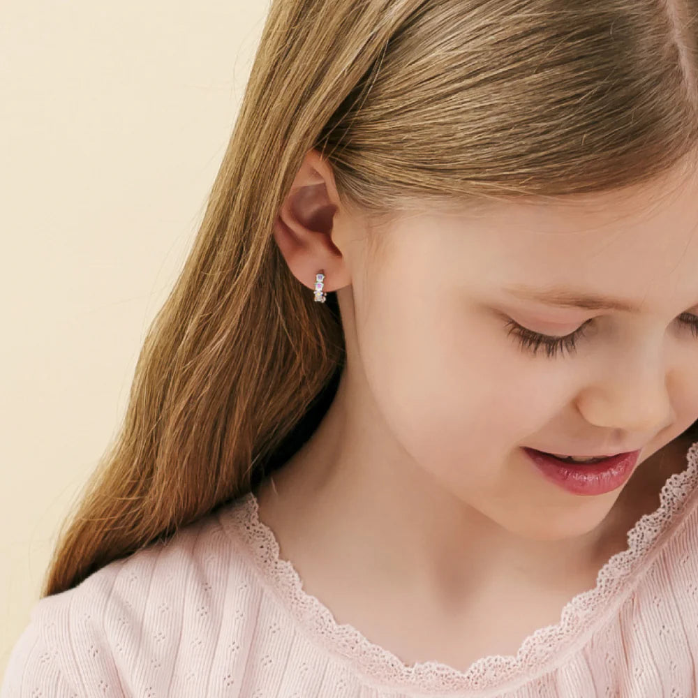 Zilveren kinderoorbellen: Creolen met sterretjes